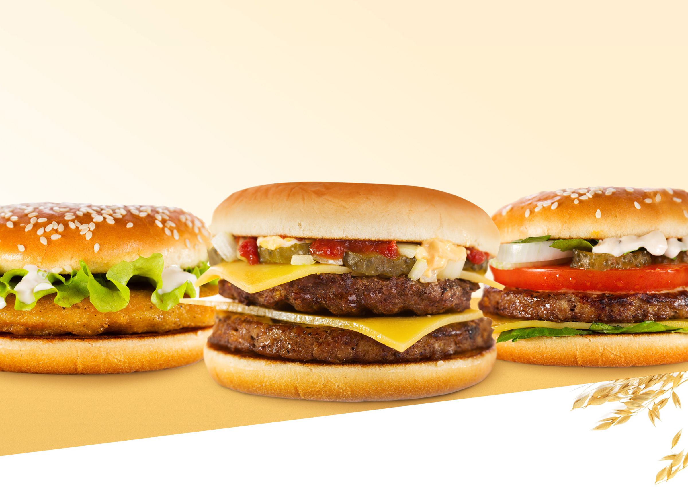 Chicken sandwich, double cheeseburger, and cheeseburger on freshly baked Northeast Foods breads.